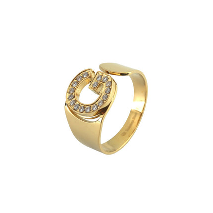 Delicate ring with initial and cubic zirconia.
