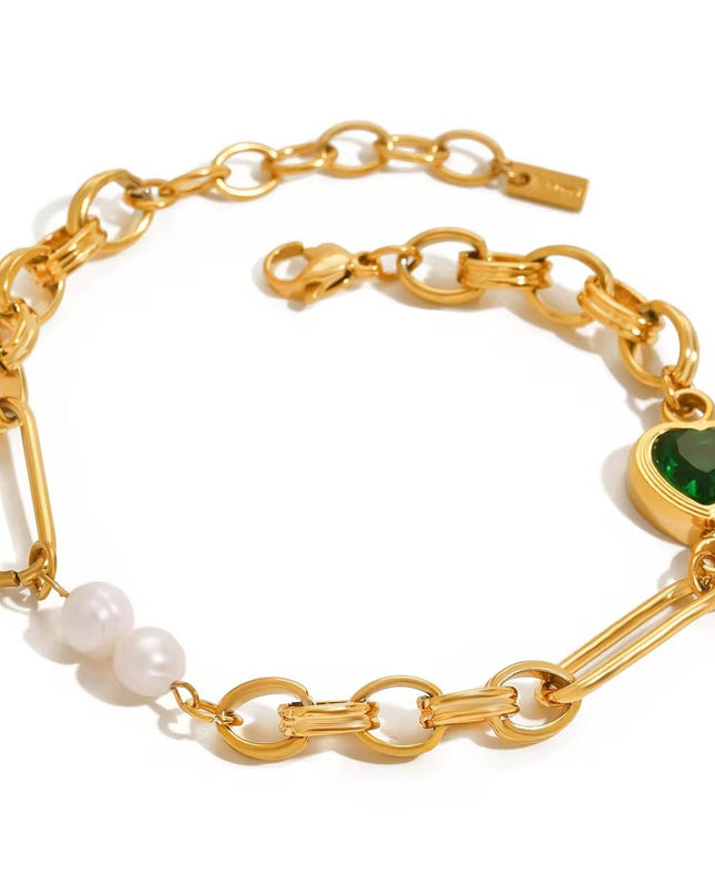 Stainless steel necklace with green hearts.