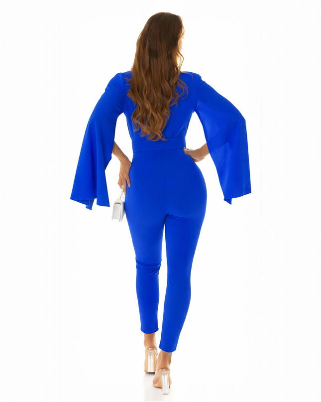 Elegant jumpsuit with cape and belt.
