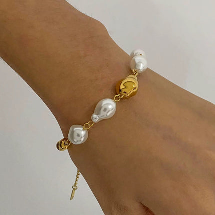 Stainless steel bracelet with pearls